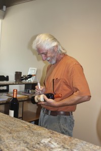 Vince graciously signed several bottles.